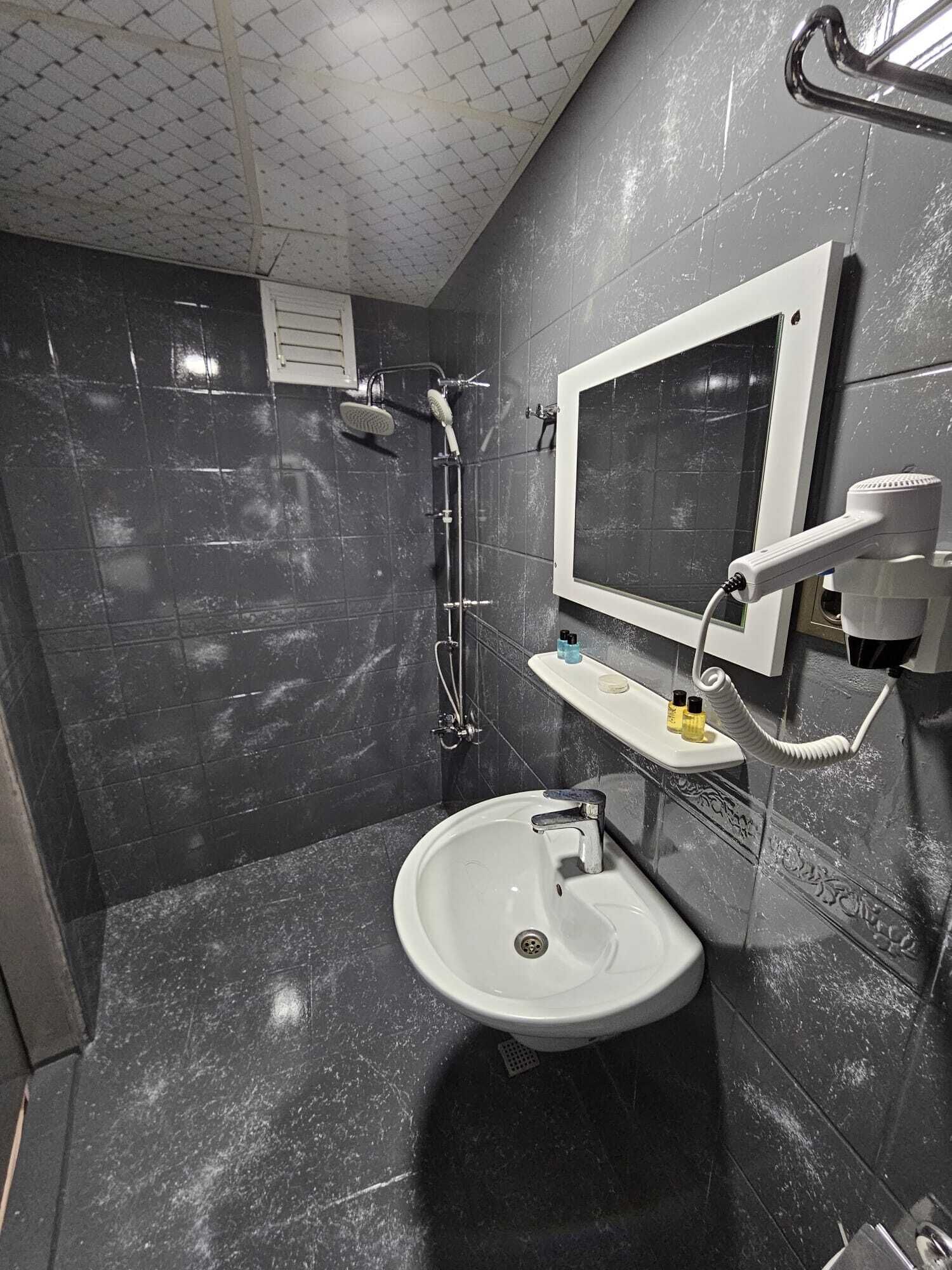 Shower, hair dryer, bathrobes, slippers