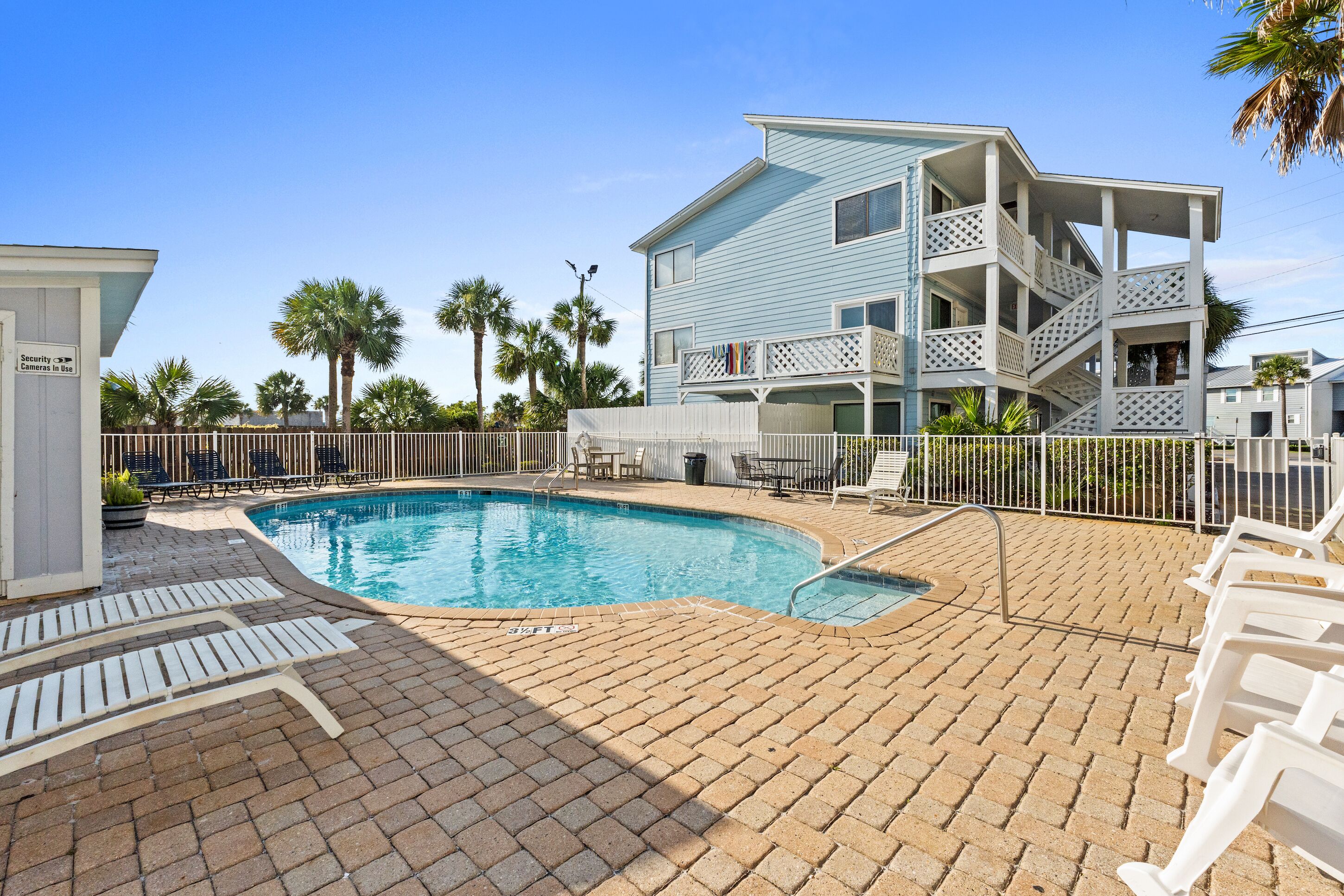 Seasonal outdoor pool, pool loungers