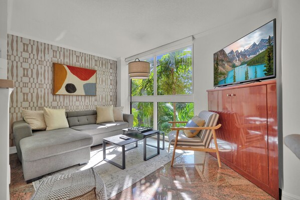 Comfort Condo, 2 Bedrooms, Balcony, Garden View | Living area - Treetop Retreat Cozy 2 Bedroom in Grove (Miami)