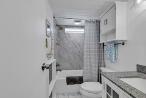 Hair dryer, towels, soap, toilet paper