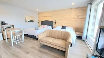 Fer et planche à repasser, lit parapluie, Wi-Fi gratuit, draps fournis