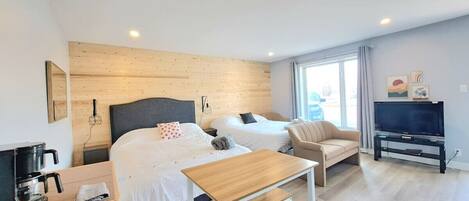 Iron/ironing board, travel crib, free WiFi, bed sheets