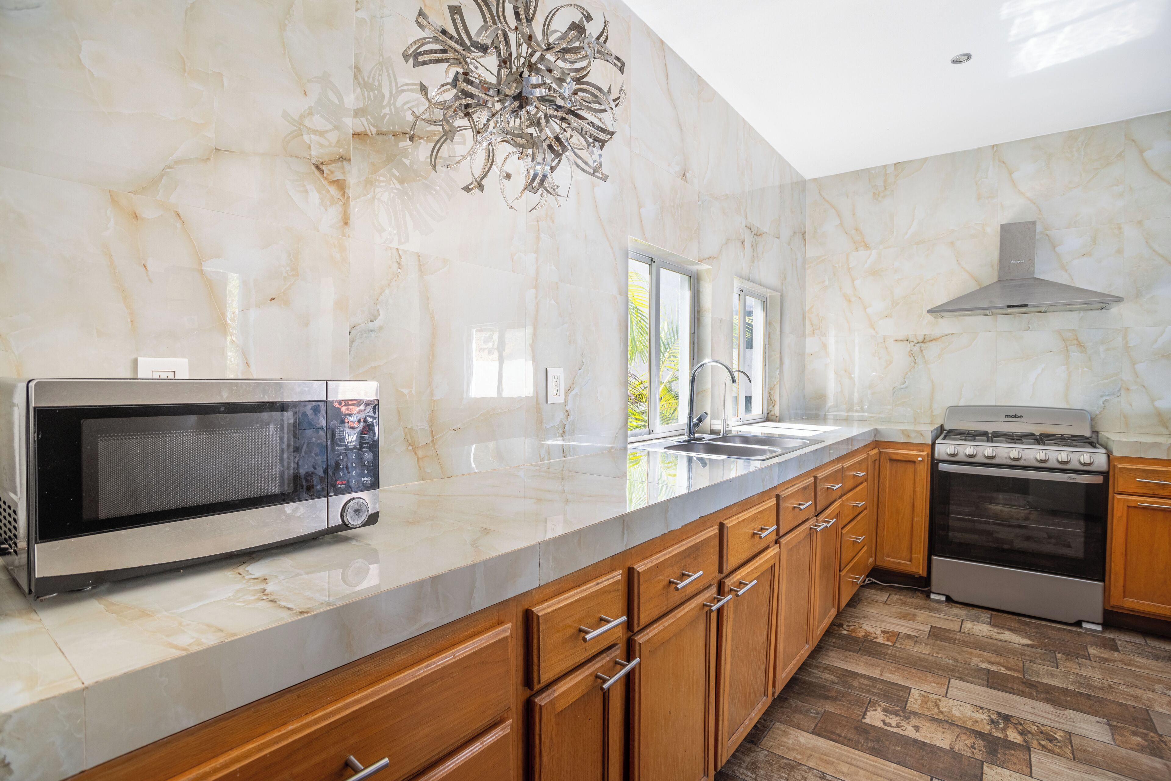 Premium House | Private kitchen | Fridge, microwave, blender, dining tables