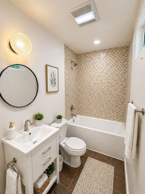 Hair dryer, towels, soap, toilet paper