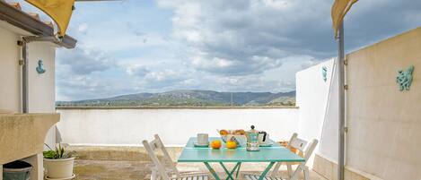 Lejlighed - bjergudsigt | Terrasse/gårdhave