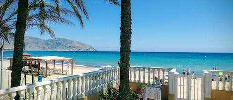 On the beach, sun loungers