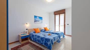 Appartamento, vista piscina | 2 camere, ferro/asse da stiro, Wi-Fi gratuito, lenzuola