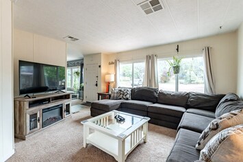 Family room with oversized sectional to relax or watch a movie