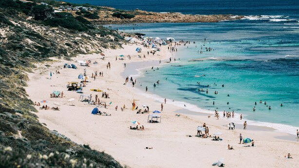 A beach with people, tents, and a rocky shoreline. - Pet-friendly. Bright and Spacious Dunsborough Home (Dunsborough)