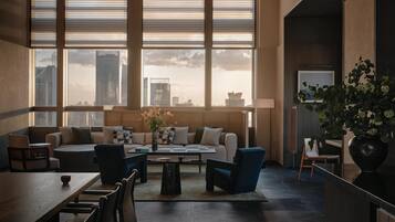 Premium bedding, down comforters, free minibar items, in-room safe