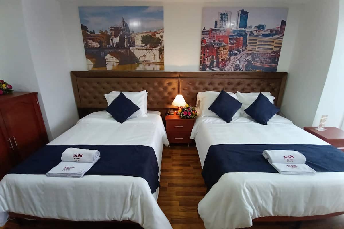 Double or Twin Room, City View | In-room safe, desk, laptop workspace, soundproofing