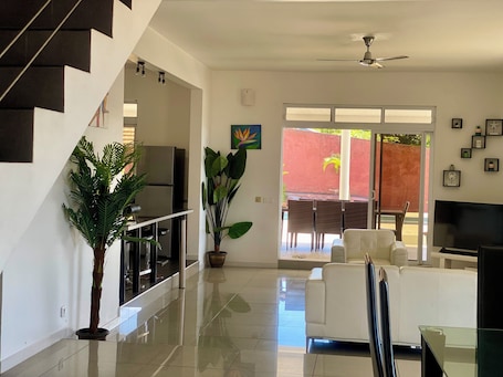 Villa, Lagoon View | Living area | Flat-screen TV. Villa Outuorau