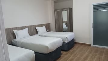 Ropa de cama de alta calidad, minibar y escritorio