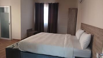 Premium bedding, minibar, desk, laptop workspace