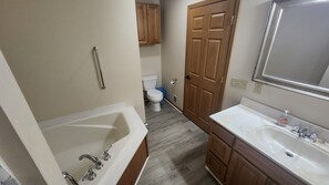 Shower, jetted tub, towels, soap - East Jordan Condo across the street from the beach! (East Jordan)