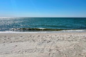 A beach with visible footprints and waves. - Beautiful Chatham, Sun Sand & Surf. 8/10 mile to beaches ,pet friendly home (Chatham)