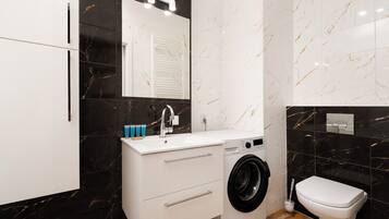 Hair dryer, towels, soap, shampoo