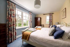 4 bedrooms, iron/ironing board, travel cot, WiFi