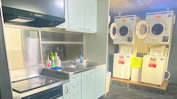 Fridge, microwave, stovetop, cookware/dishes/utensils