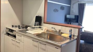 Fridge, microwave, stovetop, cookware/dishes/utensils
