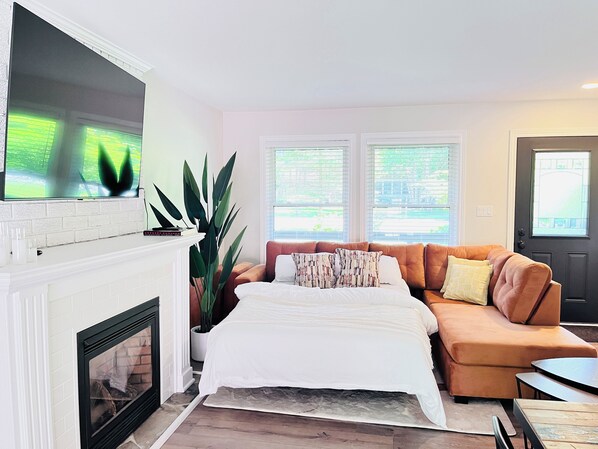 Smart TV, fireplace, foosball, books