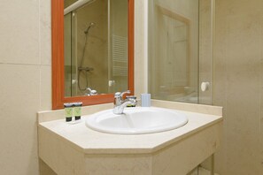 Shower, towels, soap, shampoo