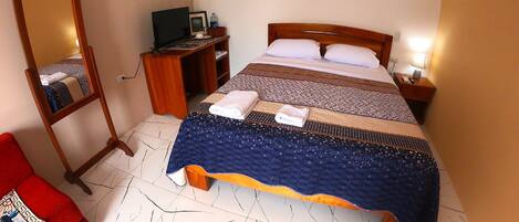 1 habitación, wifi y ropa de cama
