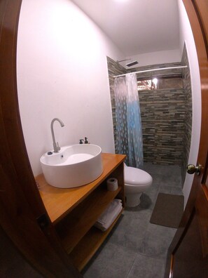 Shower, towels, soap, shampoo