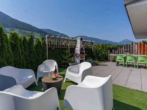 Holiday home with wood stove, sauna and garden