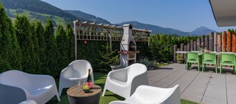 Holiday home with wood stove, sauna and garden