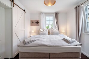 4 slaapkamers, een strijkplank/strijkijzer, gratis wifi, beddengoed