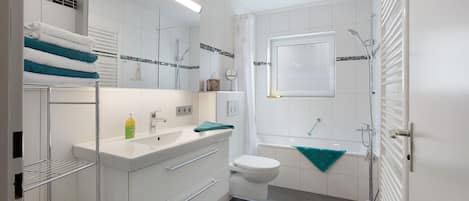 Shower, free toiletries, hair dryer, towels