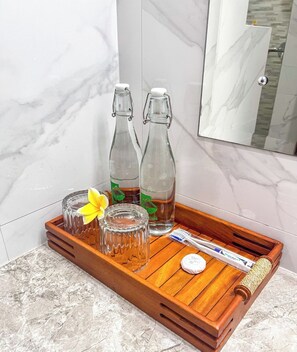 Shower, hair dryer, towels, soap