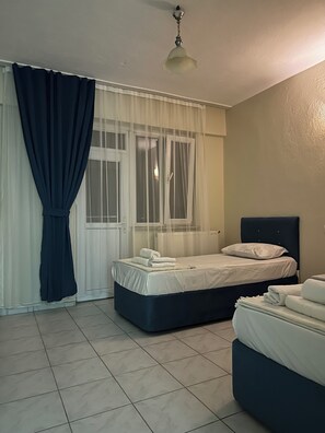 Chambre Classique avec lits jumeaux | Draps italiens Frette, literie de qualité supérieure