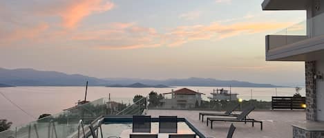 Luxury Townhome, 2 Bedrooms, Kitchen, Poolside | Terrace/patio