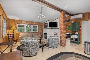 Smart TV, fireplace, books