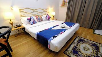 Deluxe Room, Balcony, City View | 1 bedroom, premium bedding, memory-foam beds, in-room safe