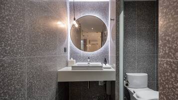 Standard Room, 1 King Bed, Private Bathroom, City View | Bathroom | Shower, hair dryer, towels, soap