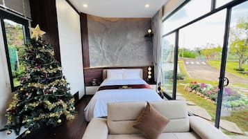 Junior Villa, Garden View | 1 bedroom, premium bedding, in-room safe, individually decorated