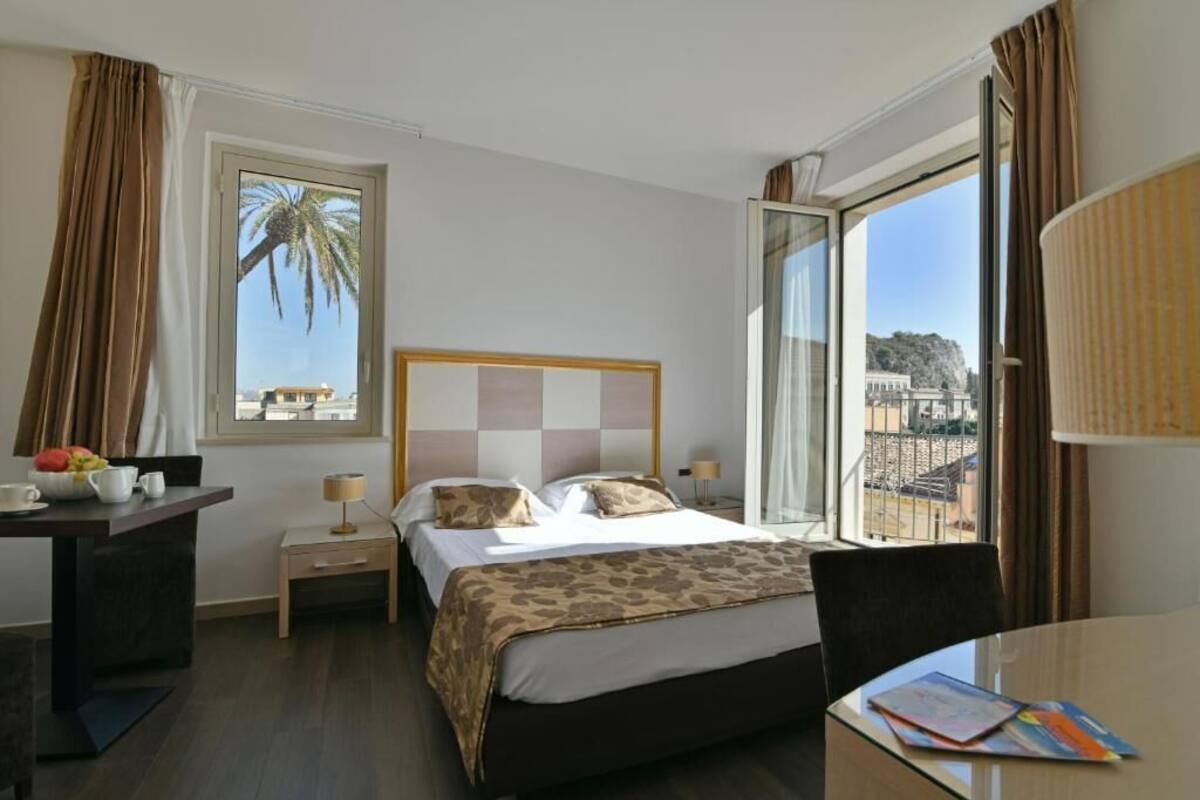 Premium bedding, down comforters, minibar, in-room safe