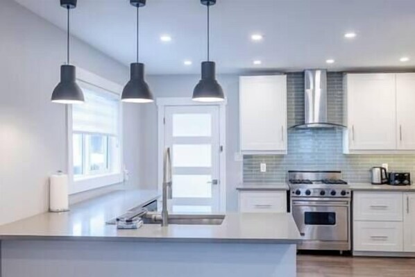 Fridge, microwave, oven, stovetop - Renovated Downtown Home / Wood Fireplace / 2 BDRM (Fernie)