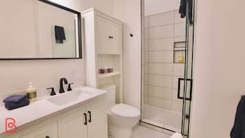 Hair dryer, towels, soap, shampoo