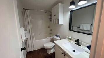 Hair dryer, towels, soap, shampoo