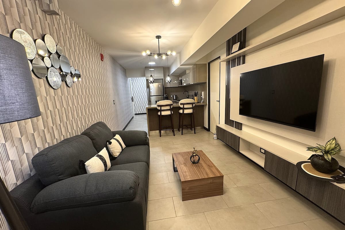 Appartement Affaires, 1 chambre, service de ménage, niveau Exécutif | Coin séjour