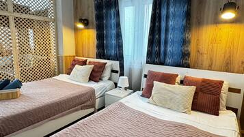 1 slaapkamer, een strijkplank/strijkijzer, gratis wifi, beddengoed