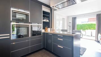 Coffee/tea maker, fridge, microwave, oven