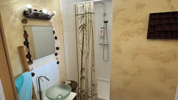 Shower, towels, soap, toilet paper