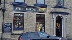 A building with a sign reading "Shepherds Rest" and a car parked in front. - The Shepherds Rest (Sowerby Bridge)