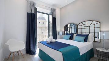 1 slaapkamer, donsdekens, verduisterende gordijnen, geluiddichte muren