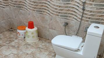 Deluxe Double Room, City View | Bathroom | Shower, rainfall showerhead, towels, soap